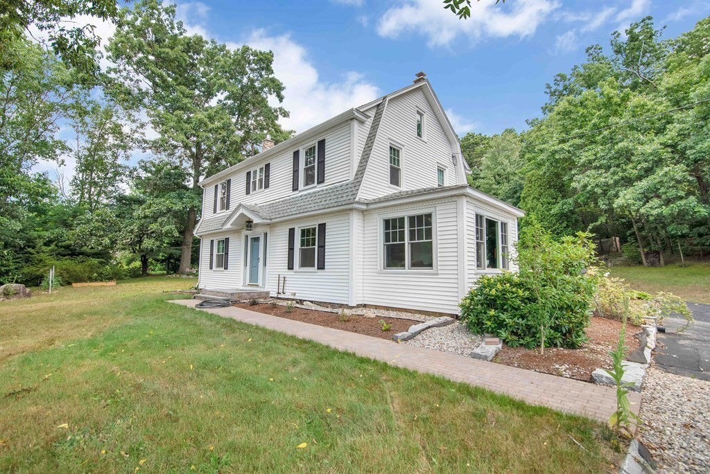 15 Three Rivers Road Wilbraham, MA 01095 - Photo 7 of 37 a front view of a house with a yard