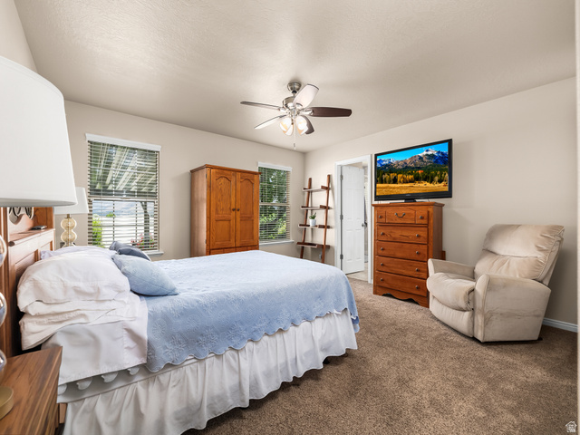 1602 Renaissance Way Springville, UT 84663 - Photo 15 of 42 Carpeted bedroom featuring neutral wall tones and a ceiling fan