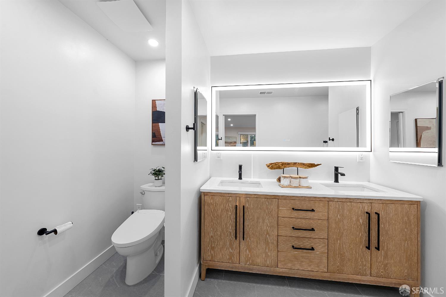 923 Janet Lane Lafayette, CA 94549 - Photo 20 of 43 a bathroom with a granite countertop toilet sink and mirror