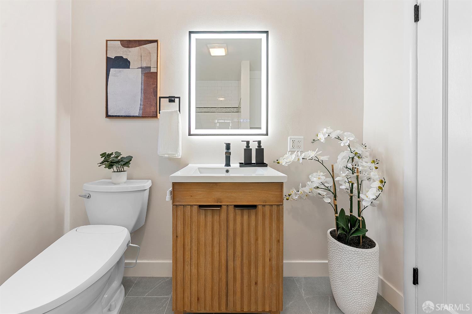923 Janet Lane Lafayette, CA 94549 - Photo 30 of 43 a bathroom with a sink a toilet and a mirror