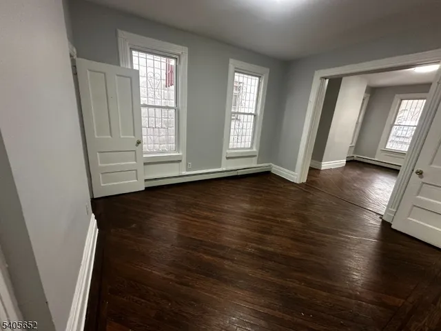 a kitchen with a stove top oven sink and cabinets