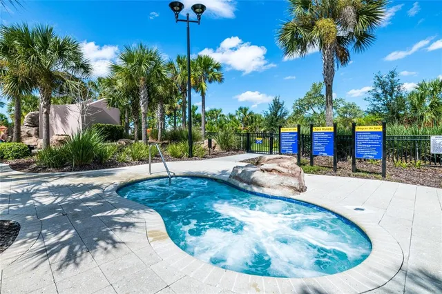 a view of a basketball room with a tree