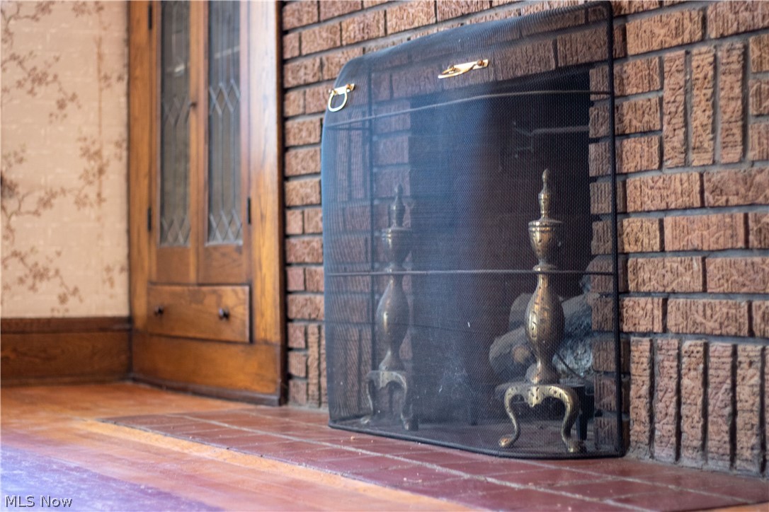 3839 Silsby Road Cleveland, OH 44111 - Photo 6 of 34 The fireplace, not used recently, currently has electric fire installed.