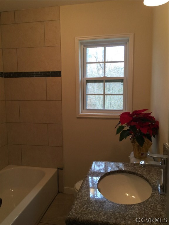 5315 Courthouse Road Chesterfield, VA 23832 - Photo 16 of 23 a bathroom with a sink mirror and vanity
