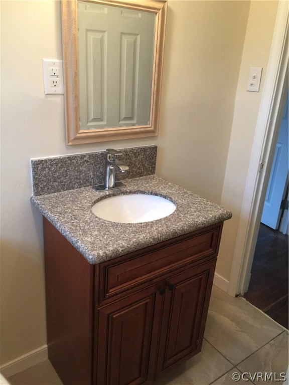 5315 Courthouse Road Chesterfield, VA 23832 - Photo 20 of 23 a bathroom with a sink and a mirror
