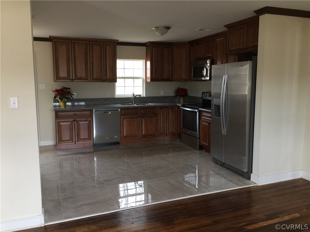 5315 Courthouse Road Chesterfield, VA 23832 - Photo 3 of 23 a kitchen with granite countertop a refrigerator stove and sink