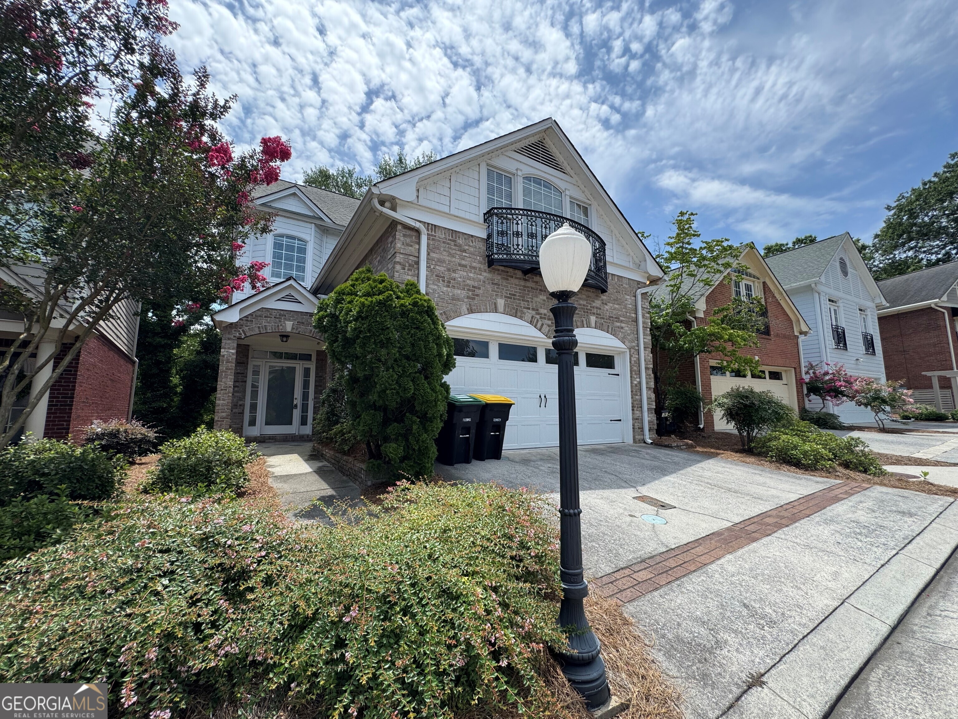 a front view of a house with yard
