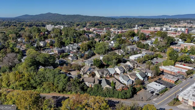 an aerial view of a city with lots of residential buildings