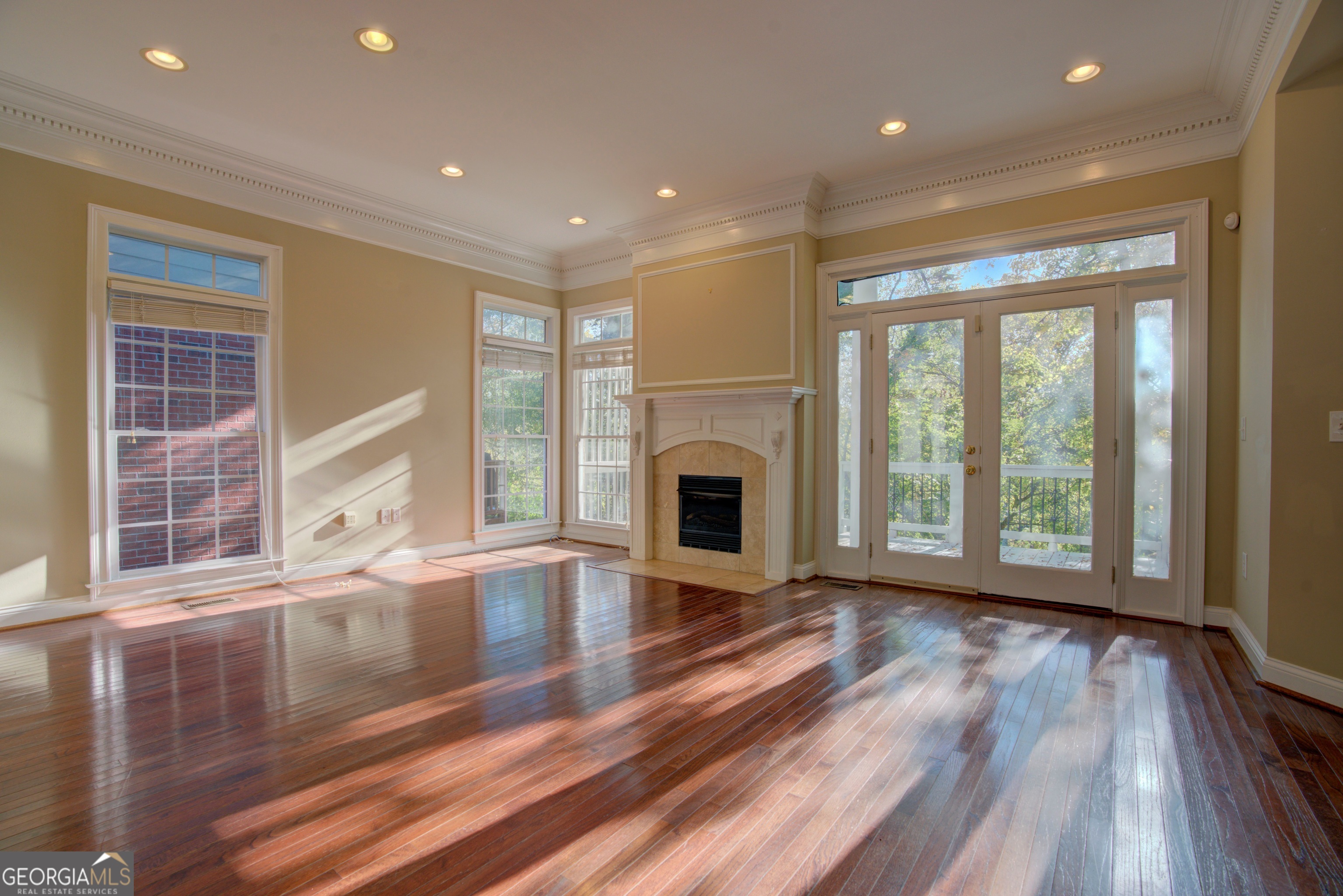 29 Pear Street Rome, GA 30161 - Photo 17 of 55 a view of an empty room with wooden floor and a window