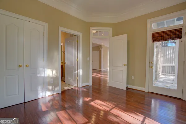 a view of entryway with wooden floor