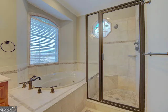a bathroom with a sink vanity and toilet