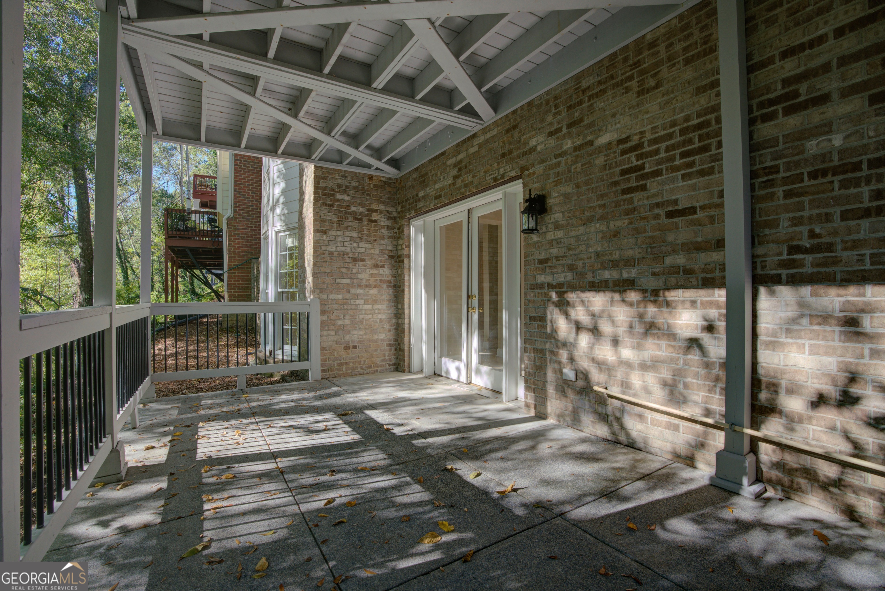 29 Pear Street Rome, GA 30161 - Photo 49 of 55 a view of a porch with a table and chairs