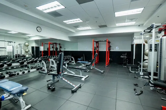 a swimming pool with outdoor seating and yard