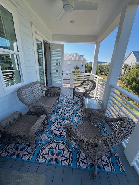 11 East Crabbing Hole Ln Inlet Beach Inlet Beach, FL 32461 - Photo 16 of 34 a living room with furniture and wooden floor