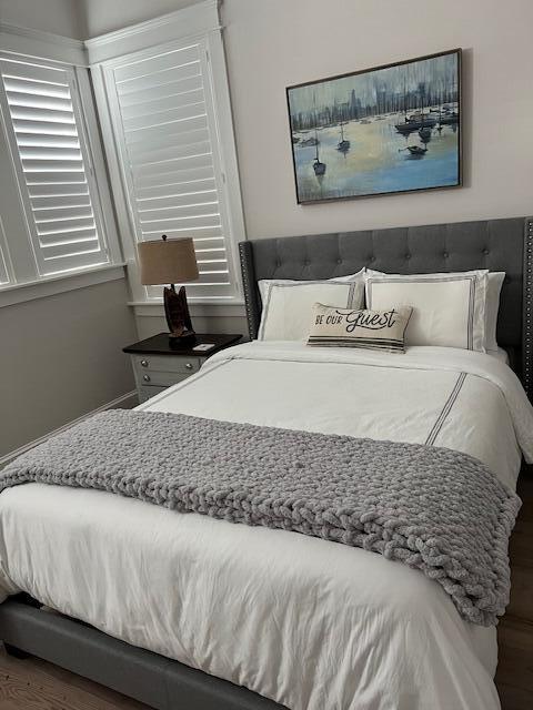 11 East Crabbing Hole Ln Inlet Beach Inlet Beach, FL 32461 - Photo 17 of 34 a bedroom with a bed and a painting on the wall