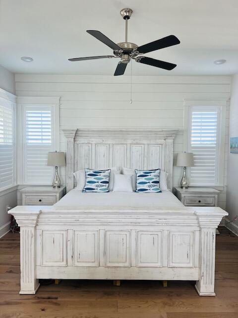 11 East Crabbing Hole Ln Inlet Beach Inlet Beach, FL 32461 - Photo 24 of 34 a bedroom with a white bed dresser and a window