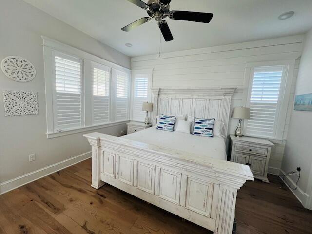 11 East Crabbing Hole Ln Inlet Beach Inlet Beach, FL 32461 - Photo 25 of 34 a bedroom with a bed a dresser and a window