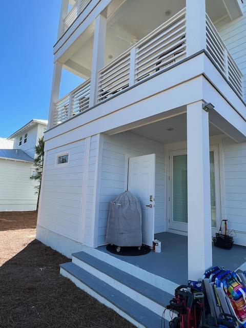 11 East Crabbing Hole Ln Inlet Beach Inlet Beach, FL 32461 - Photo 28 of 34 a view of front door of house