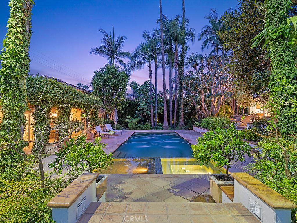 726 Foothill Road Beverly Hills, CA 90210 - Photo 2 of 59 a view of a yard with plants