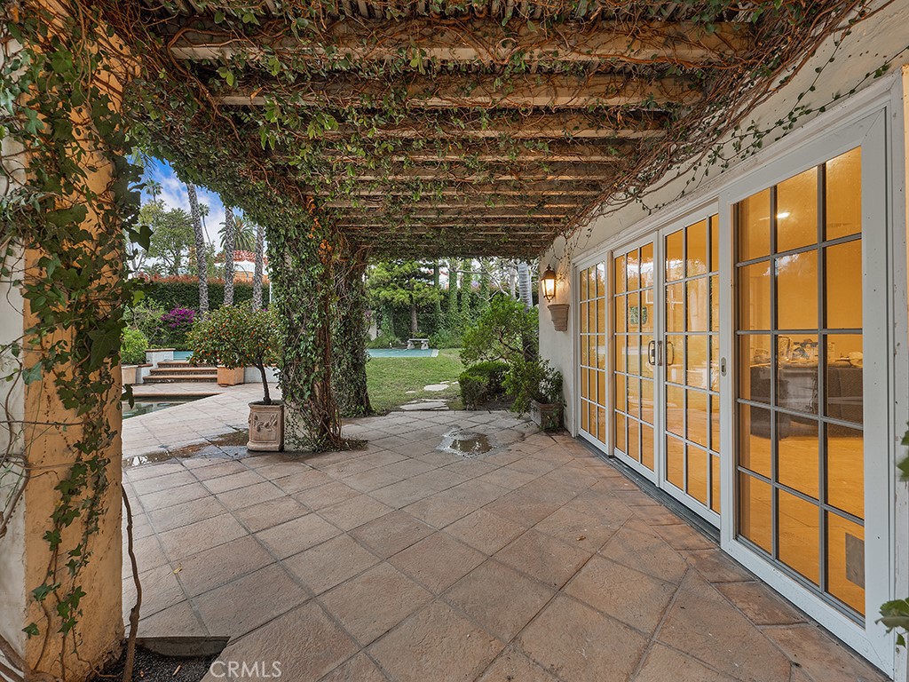 726 Foothill Road Beverly Hills, CA 90210 - Photo 44 of 59 a view of a backyard with pathway