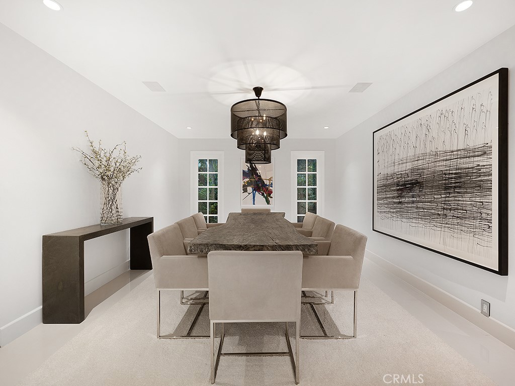 726 Foothill Road Beverly Hills, CA 90210 - Photo 6 of 59 a dining room with furniture and window