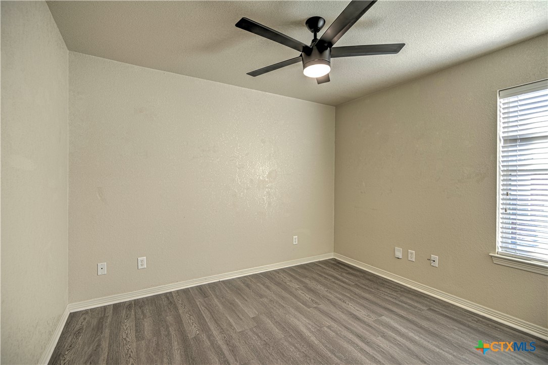 3106 Pitchfork Circle Belton, TX 76513 - Photo 29 of 45 an empty room with a window and a fan
