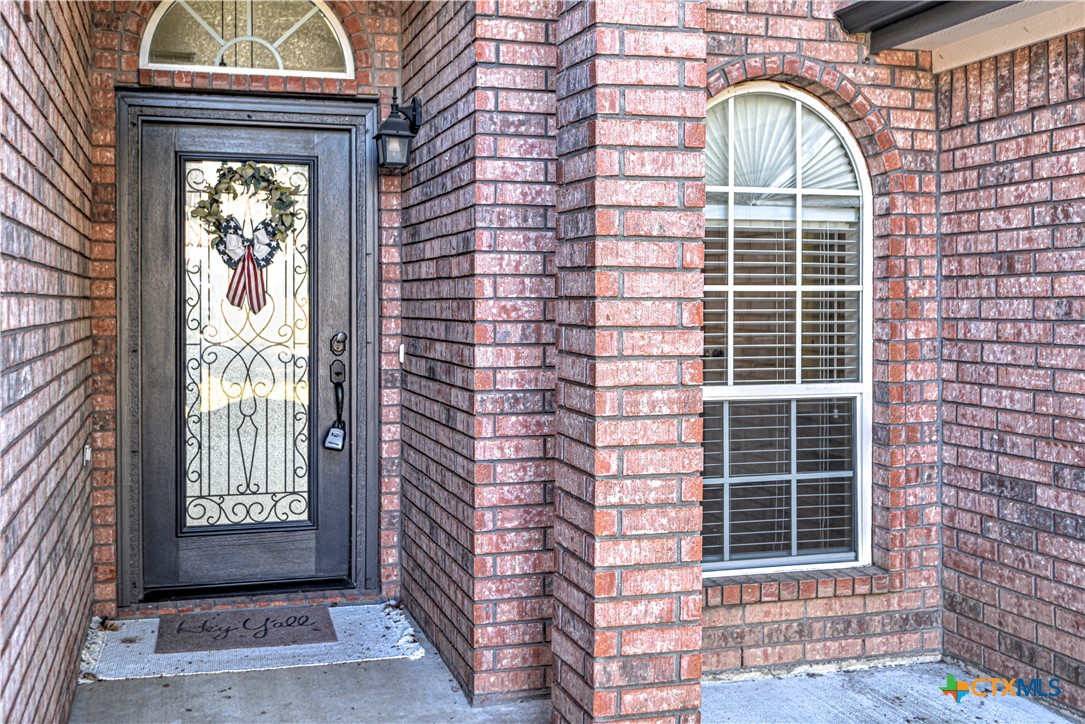 3106 Pitchfork Circle Belton, TX 76513 - Photo 3 of 45 a view of a brick house with a large windows