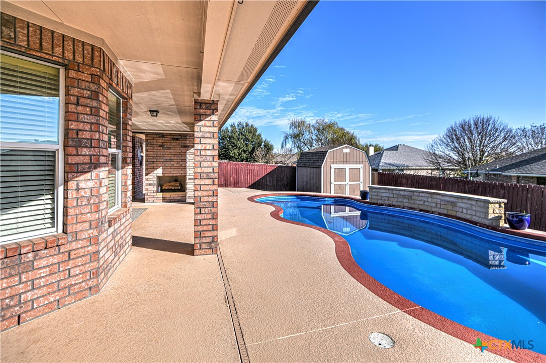 3106 Pitchfork Circle Belton, TX 76513 - Photo 36 of 45 a view of a patio with swimming pool