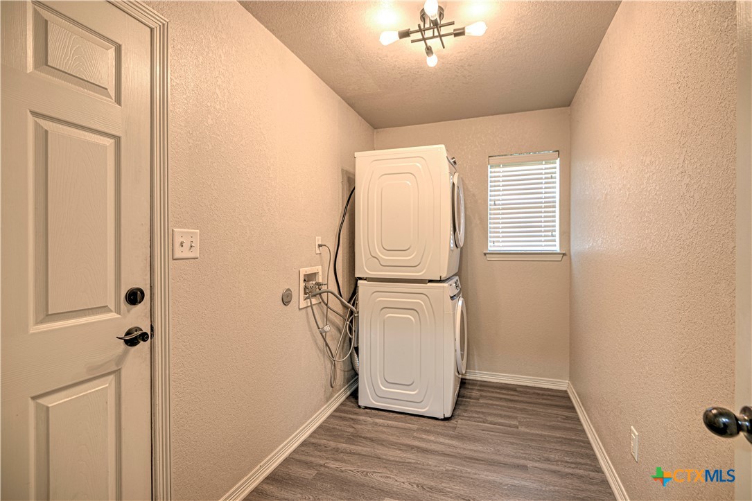 3106 Pitchfork Circle Belton, TX 76513 - Photo 41 of 45 wooden floor in an empty room