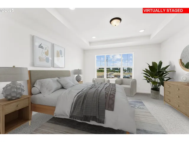a living room with furniture potted plant and a window