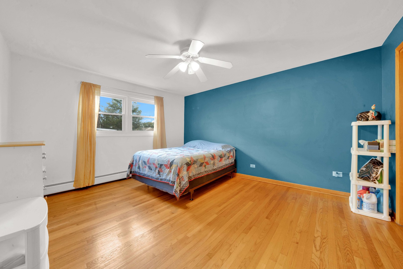 3847 West 47th Street, Unit 1E Chicago, IL 60632 - Photo 10 of 14 a bedroom with a bed and window