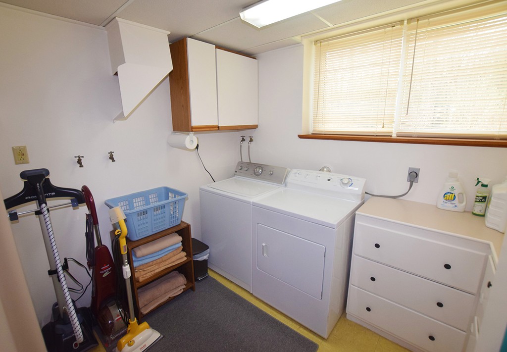 205 Monson Turnpike Road Petersham, MA 01366 - Photo 25 of 30 a utility room with cabinets dryer and washer
