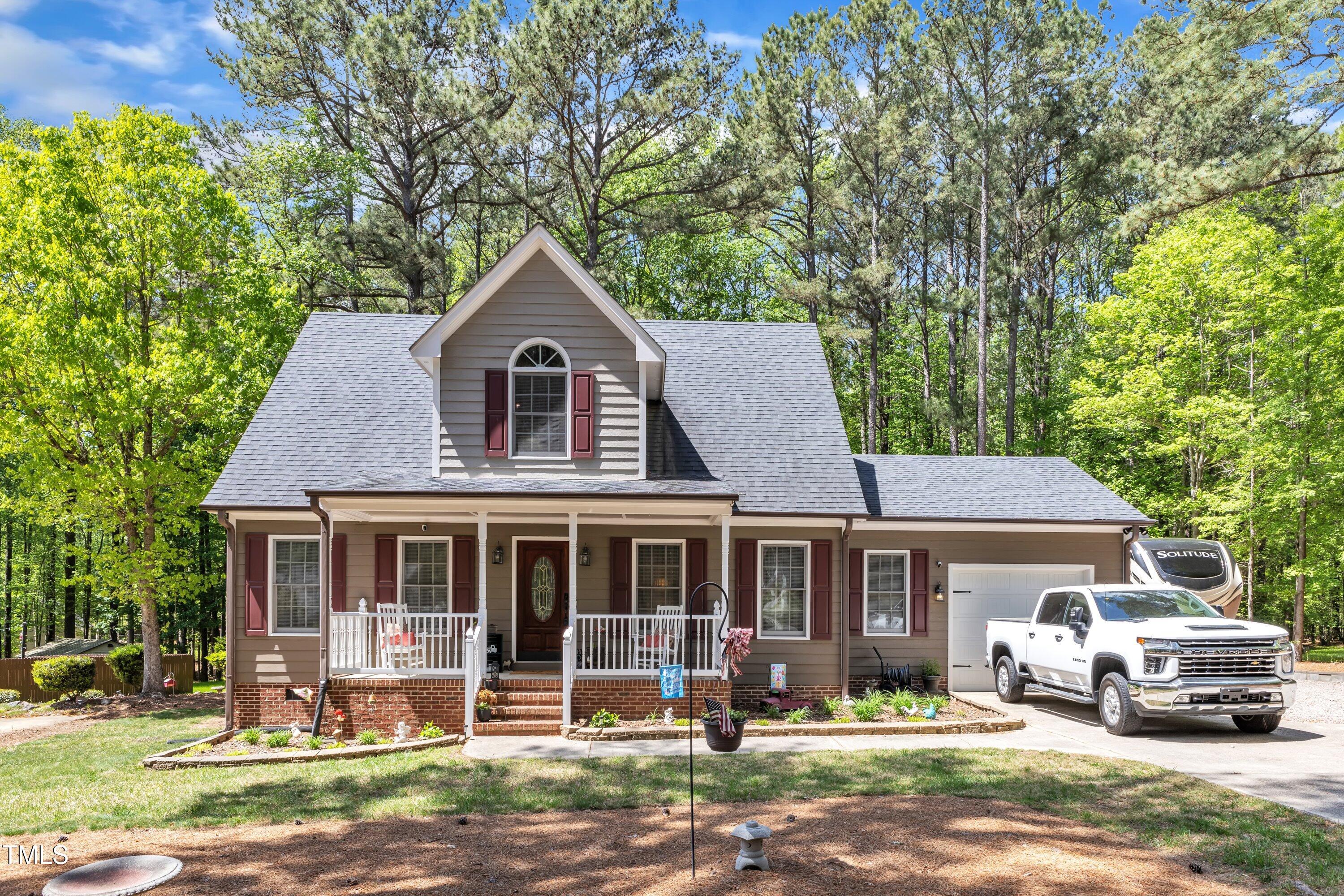 604 Young Forest Drive Wake Forest, NC 27587 - Photo 1 of 55 a front view of a house with a yard