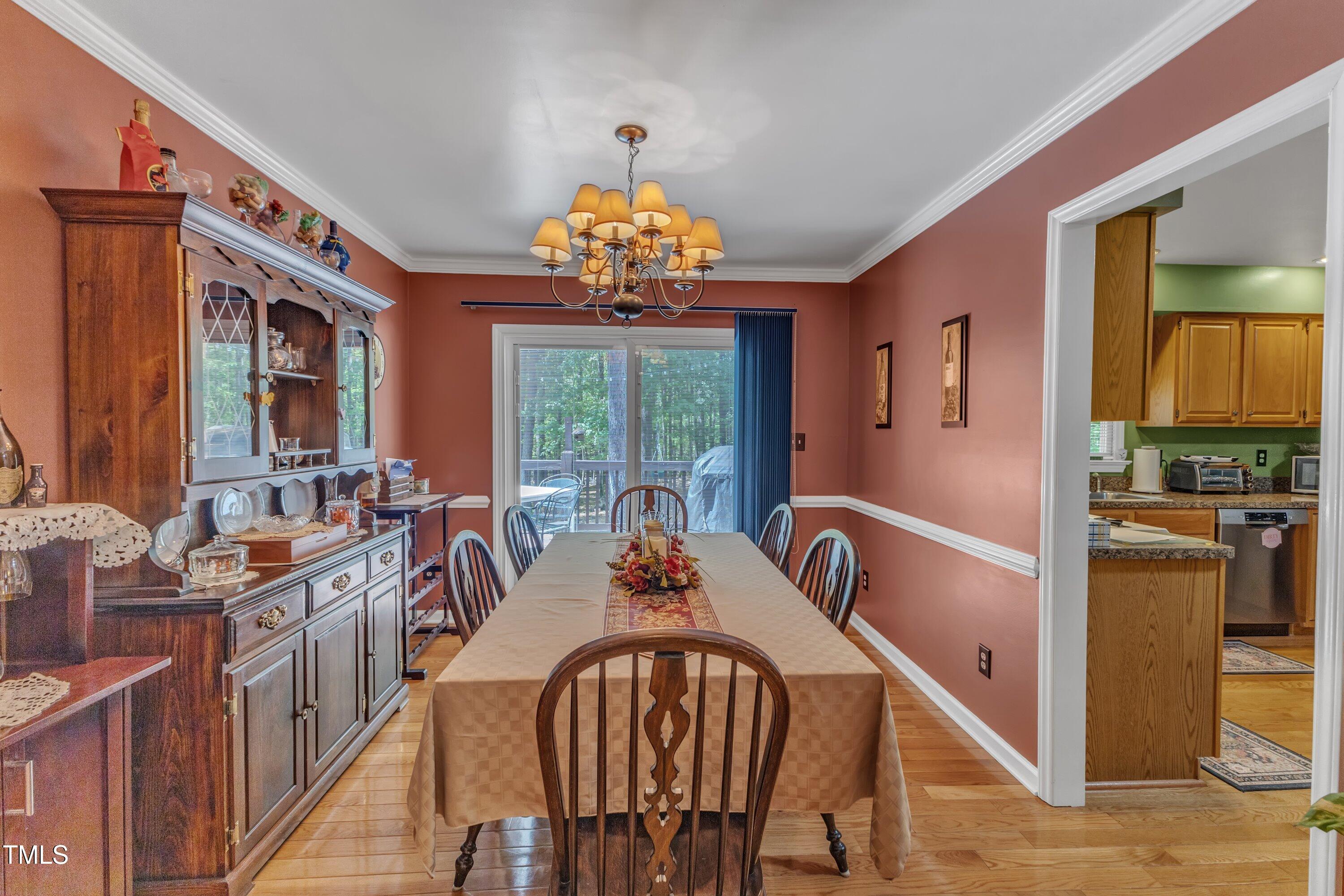 604 Young Forest Drive Wake Forest, NC 27587 - Photo 15 of 55 a view of a dining room with furniture window and outside view