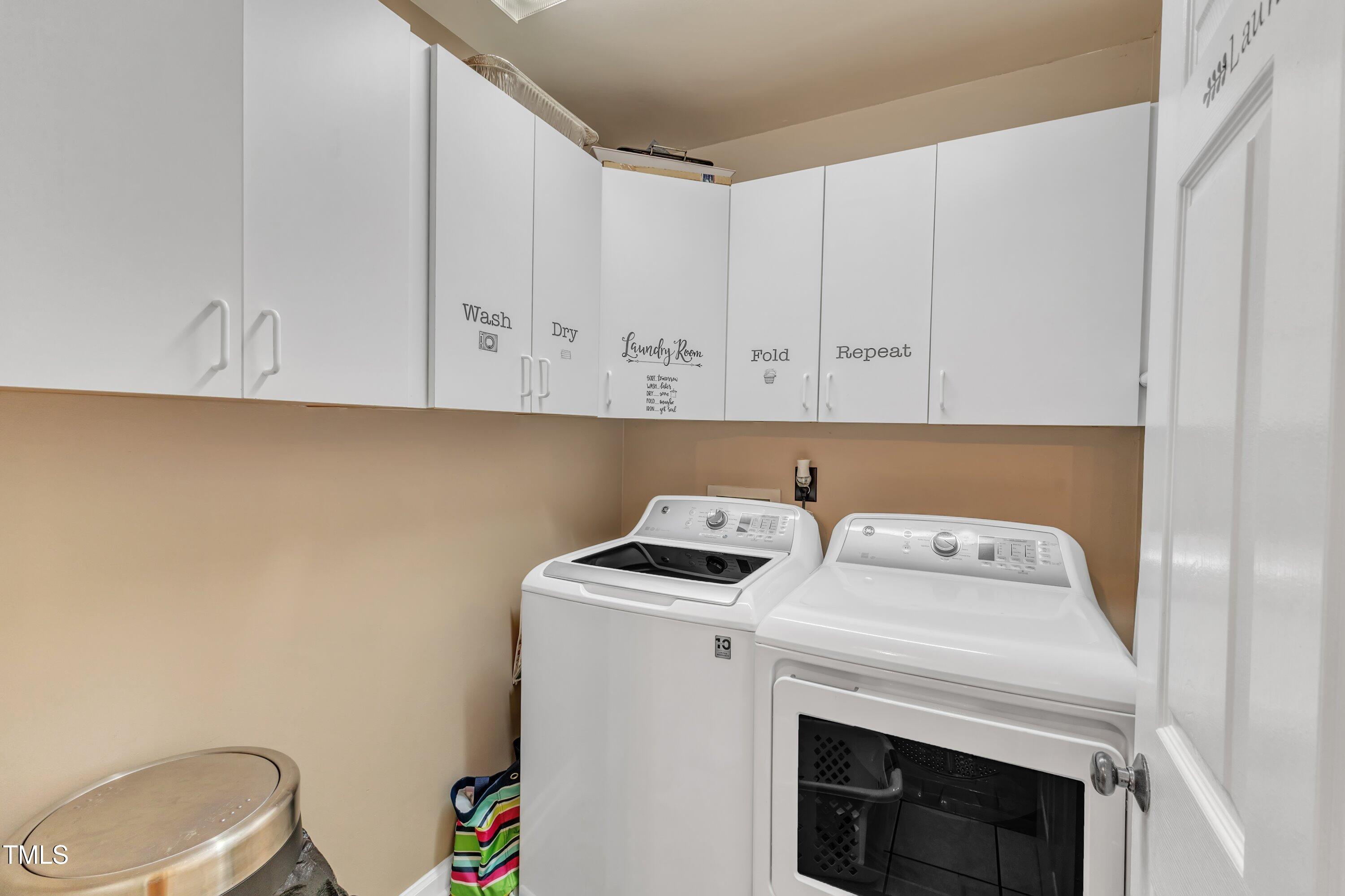 604 Young Forest Drive Wake Forest, NC 27587 - Photo 29 of 55 a utility room with dryer and washer
