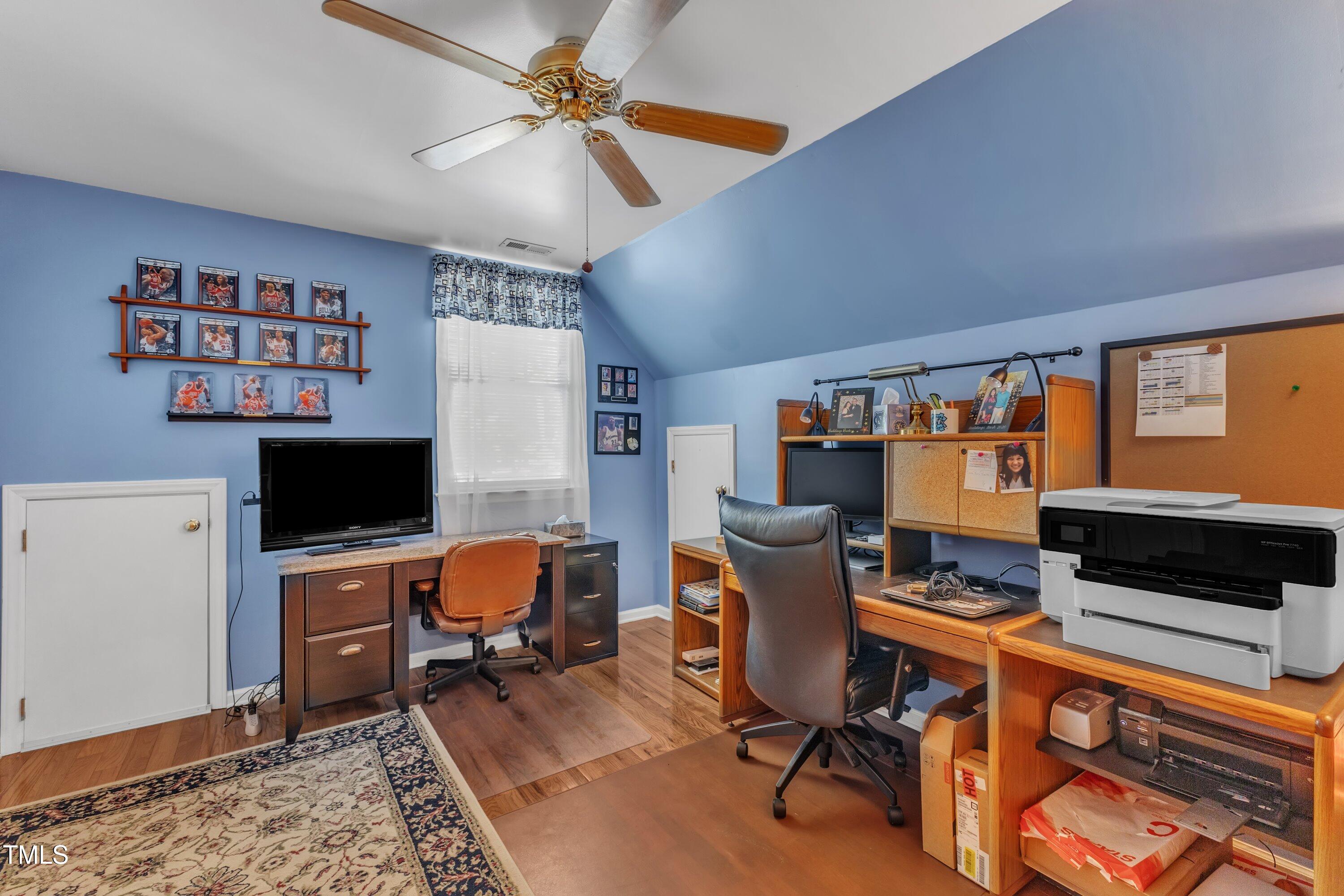 604 Young Forest Drive Wake Forest, NC 27587 - Photo 31 of 55 a view of a workspace with furniture and a window