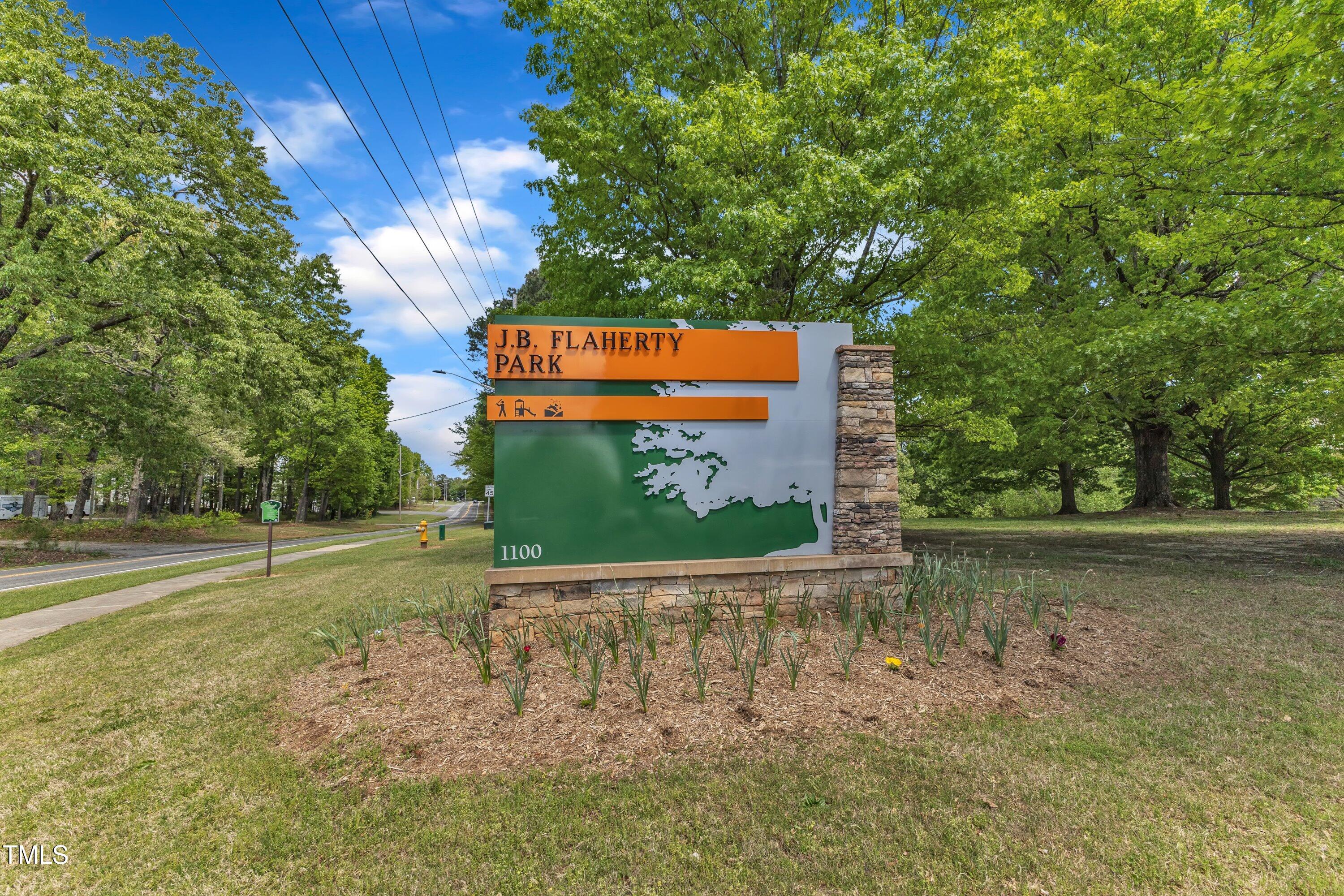 604 Young Forest Drive Wake Forest, NC 27587 - Photo 43 of 55 a view of a street with a building in the background