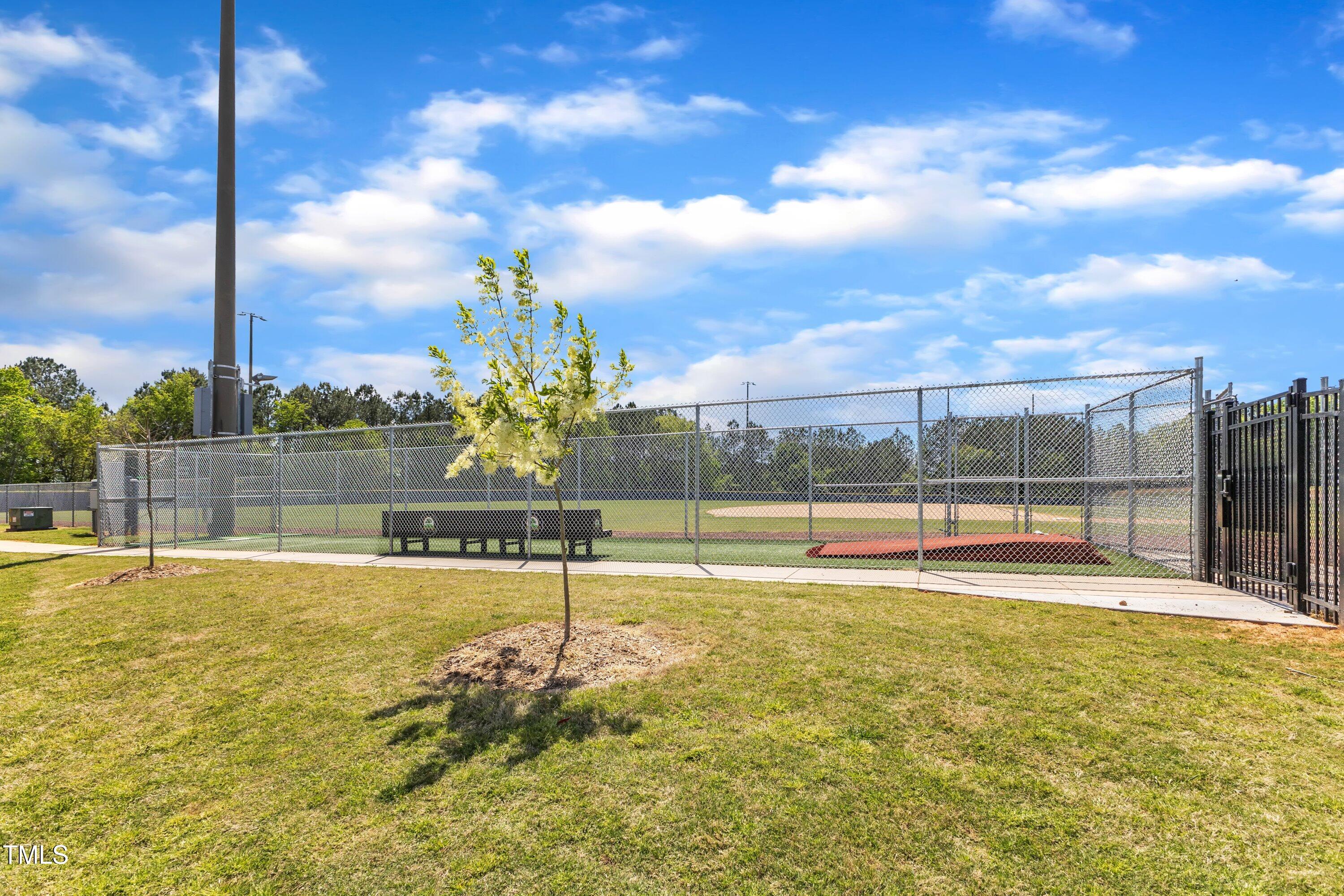 604 Young Forest Drive Wake Forest, NC 27587 - Photo 48 of 55 a view of a swimming pool with a terrace