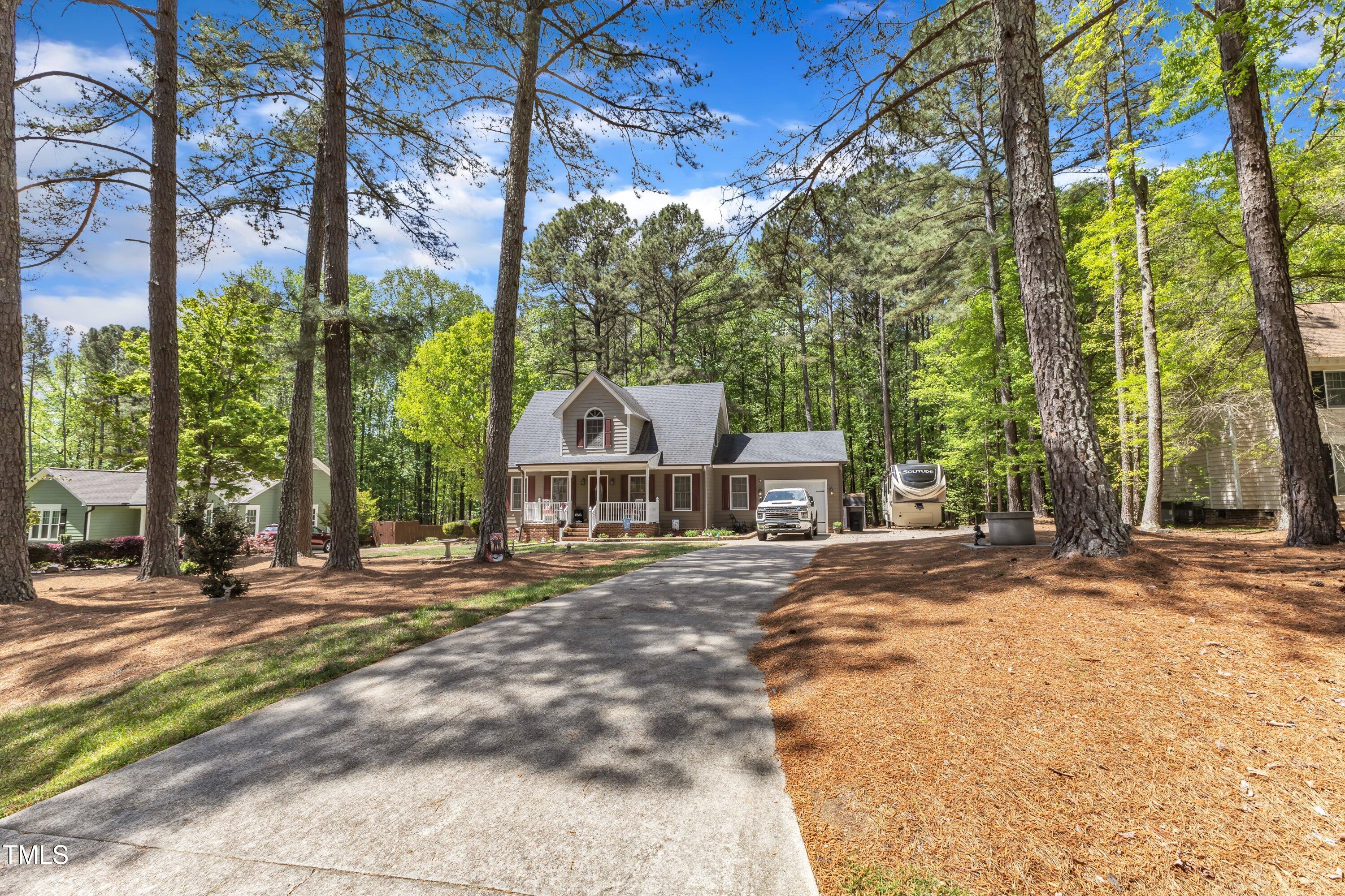 604 Young Forest Drive Wake Forest, NC 27587 - Photo 3 of 55 a view of a house with a street