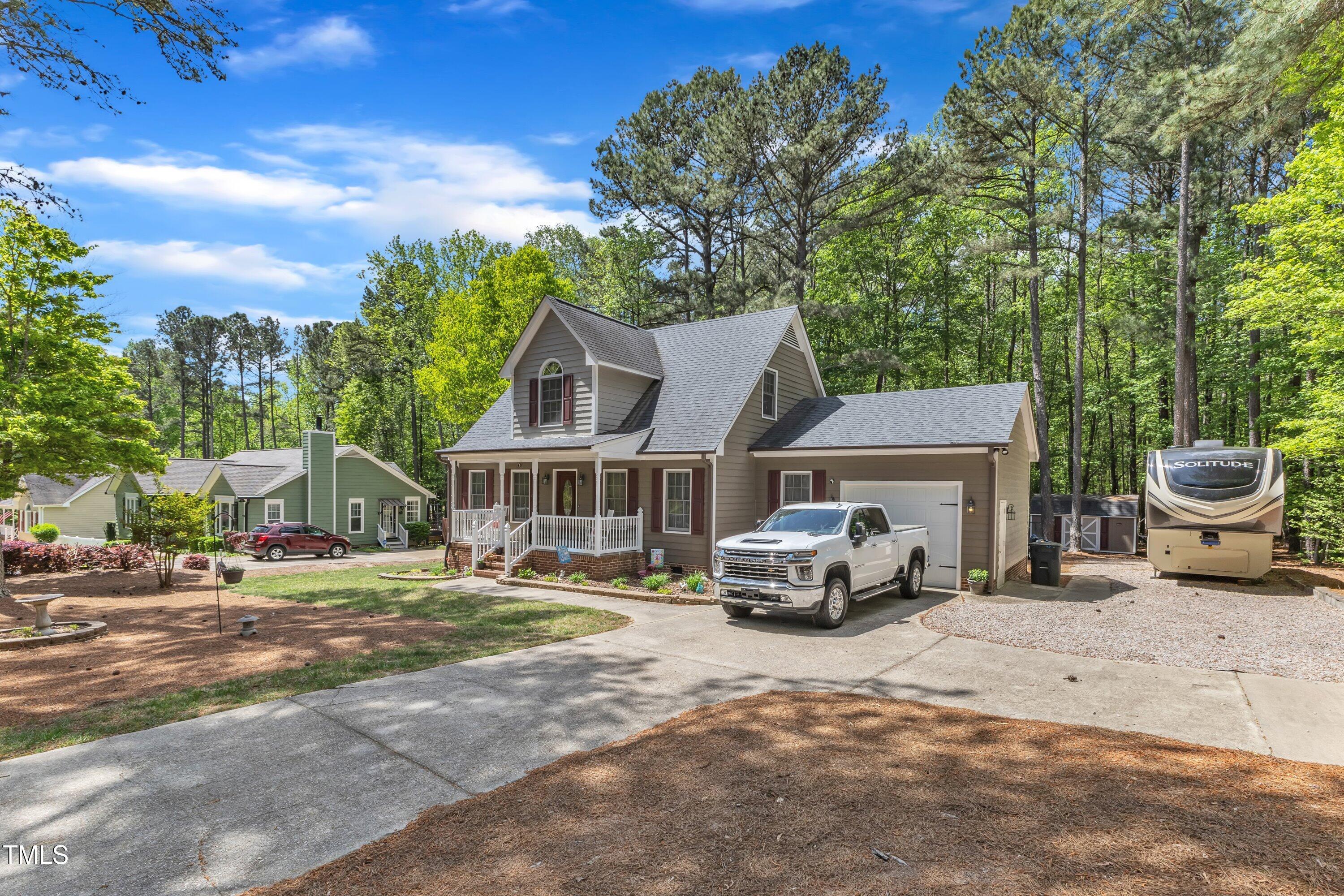 604 Young Forest Drive Wake Forest, NC 27587 - Photo 6 of 55 a car parked in front of a house