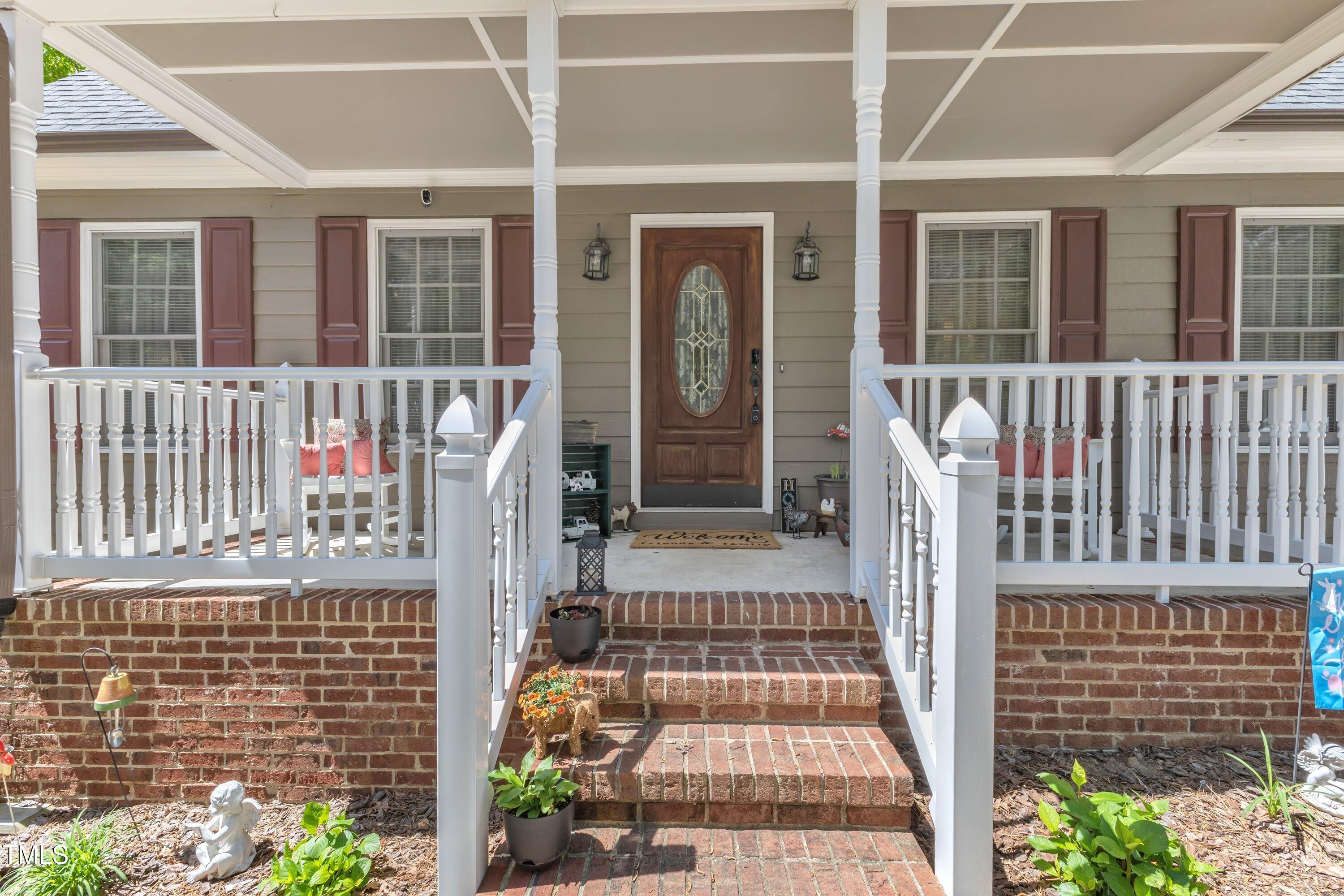 604 Young Forest Drive Wake Forest, NC 27587 - Photo 8 of 55 front view of a house with a large window