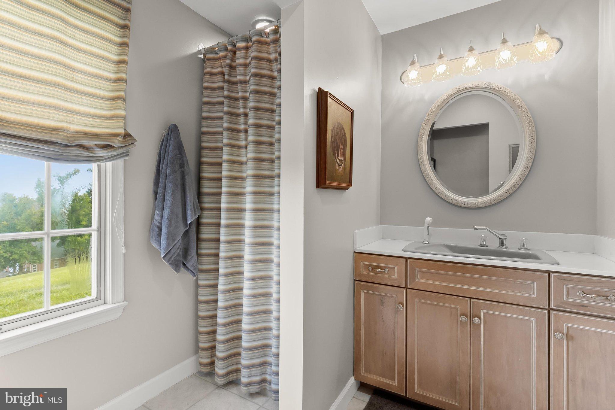 6300 Town Point Road Tracys Landing, MD 20779 - Photo 34 of 148 Main Level Primary Suite Dual Entry Bath