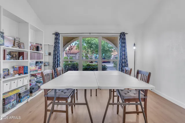 a view of a dining room with furniture window and outside view