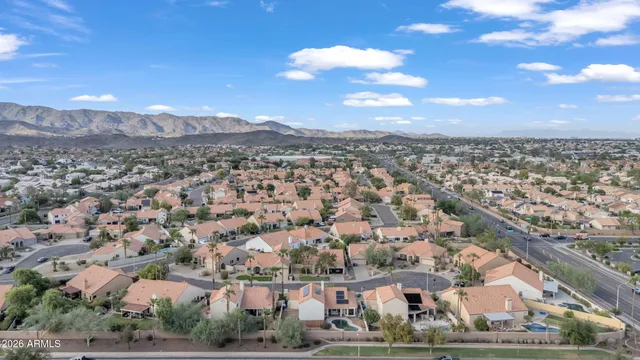 an aerial view of residential building and street