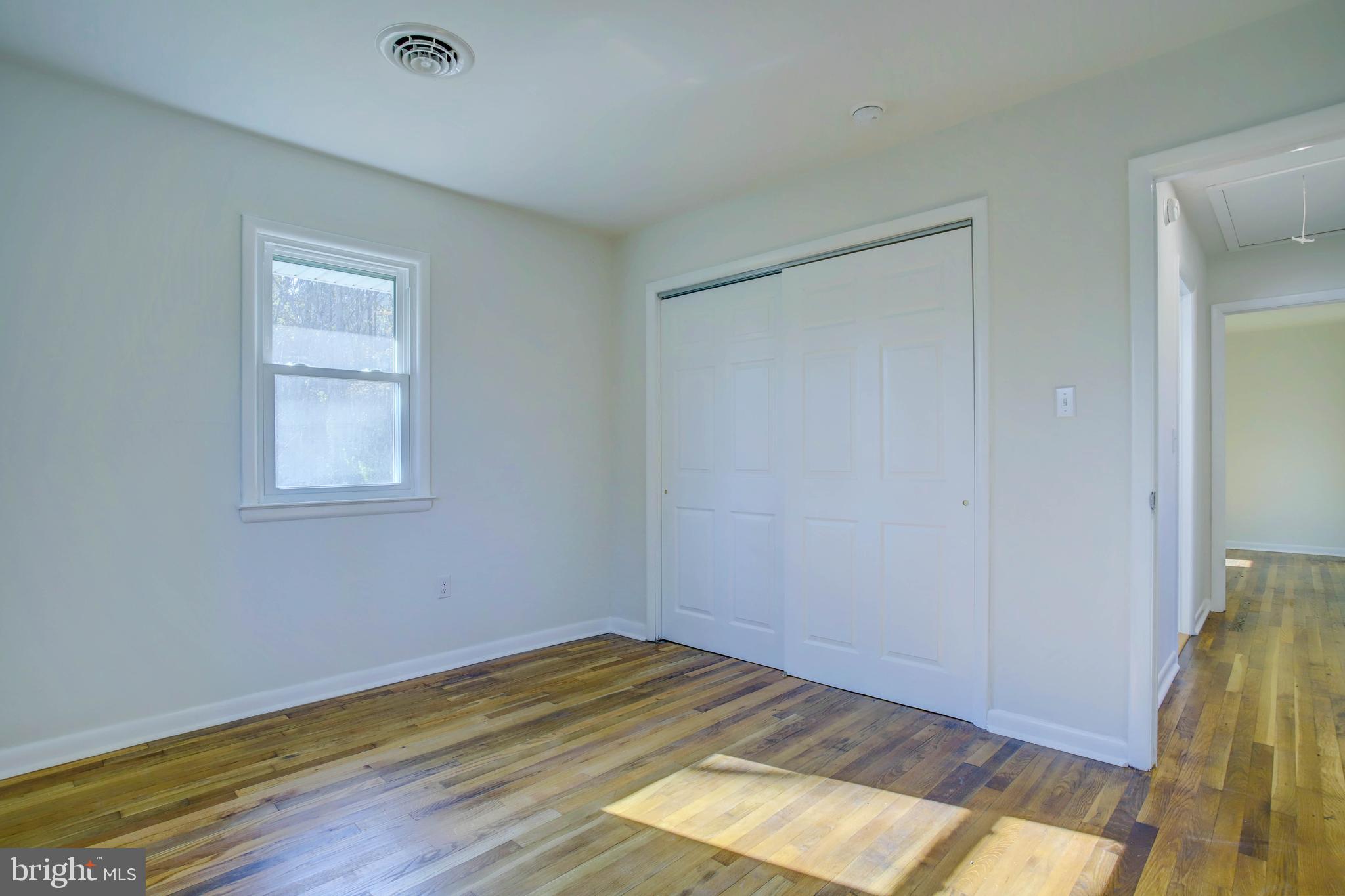 2229 Hudson Road Cambridge, MD 21613 - Photo 26 of 41 a view of empty room with wooden floor