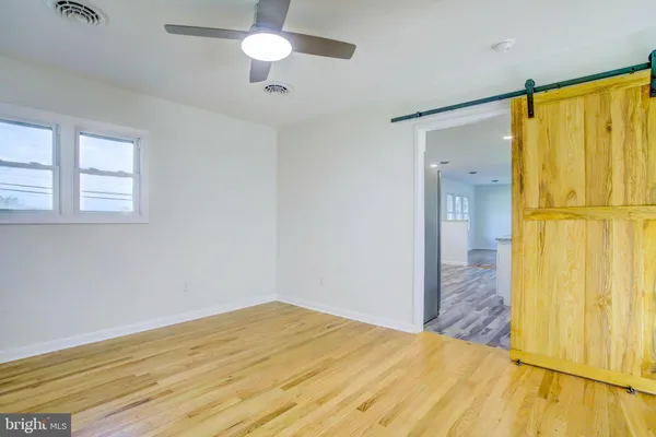 a view of walk in closet with window