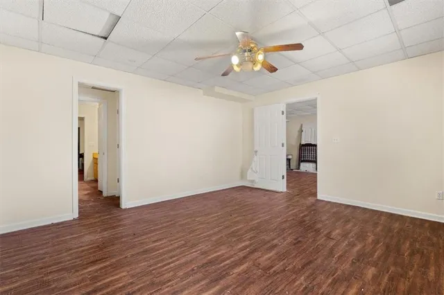 a view of a yard with a tree