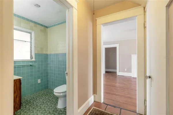 a view of an empty room with a window