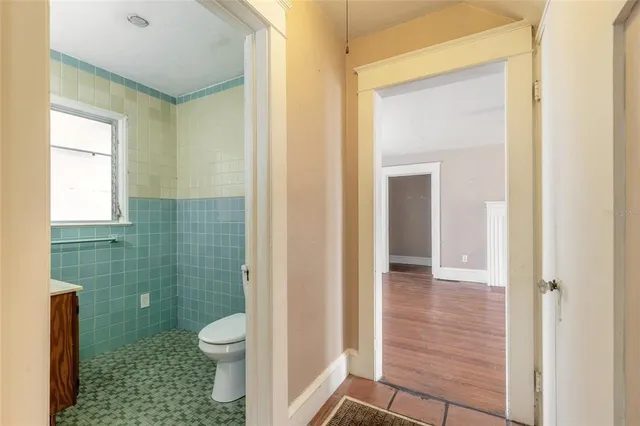 a view of an empty room with a window