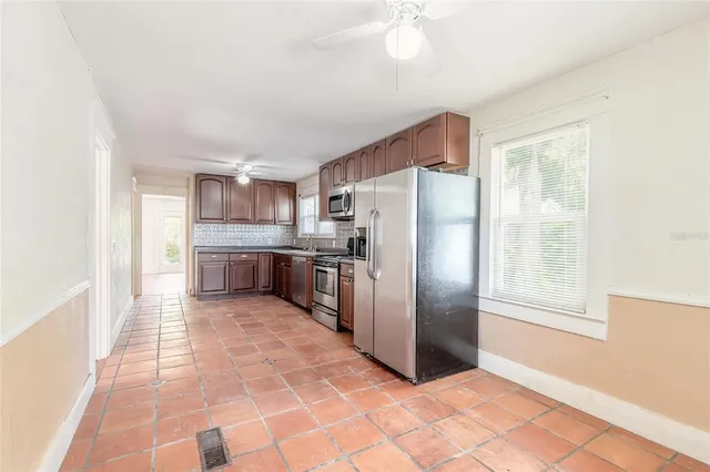 a bathroom with a toilet a sink and bathtub